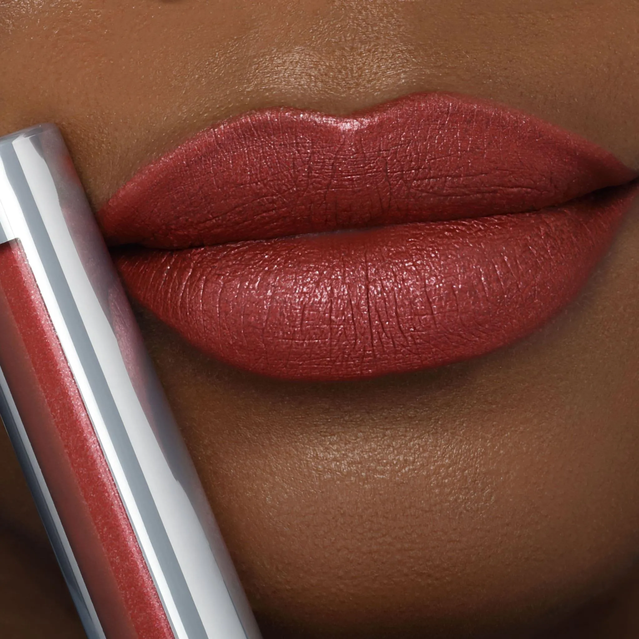 Showtime | A Warm Brick Red With Gold And Silver Shimmer Liquid Lipstick